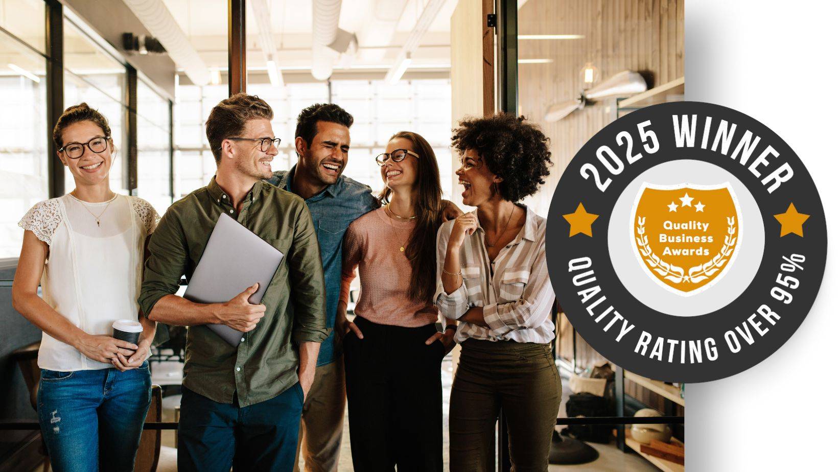 Nation Media Design Wins 2025 Best Advertising Agency, team celebrates winning 2025 Best Advertising Agency in Wyoming MI from Quality Business Awards