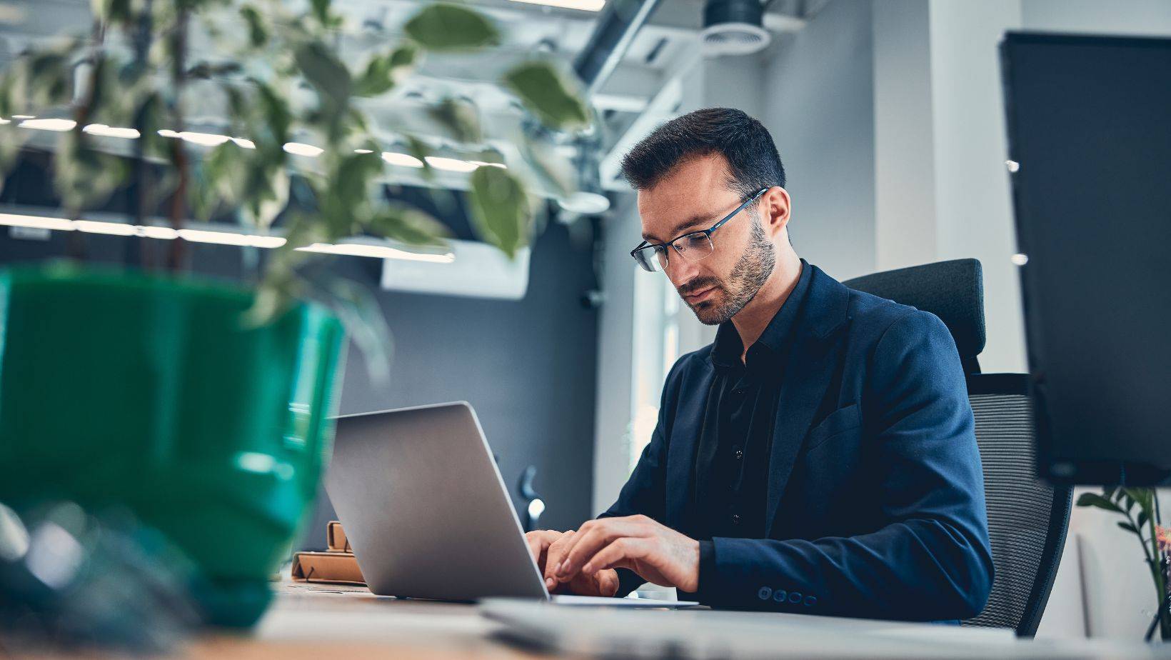 ppc trends man at desk working on Google’s non-AI feature rollouts