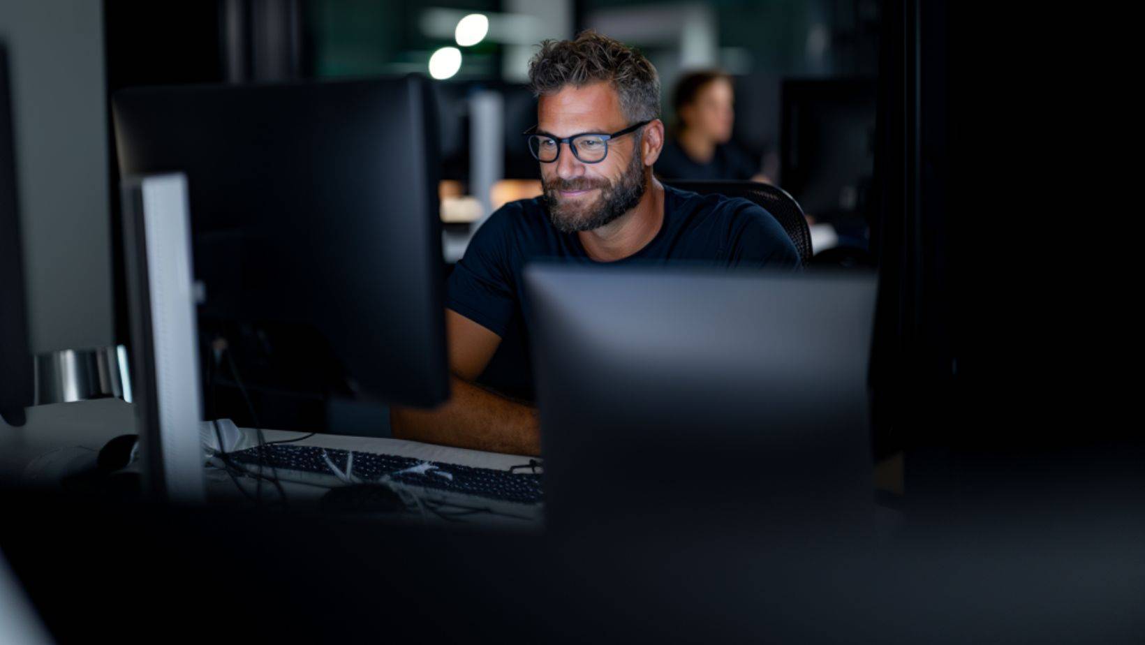 ppc trends, man working late on the next wave of AI-driven ad formats